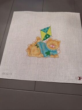 Kitty Kay’s needlepoint canvas featuring a colorful cat flying a kite. 🐈‍⬛ kit